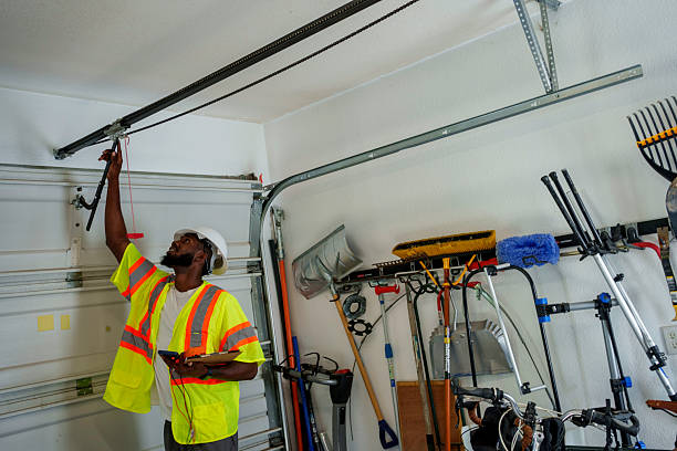 Professional Garage Door technician working in Argos, IN
